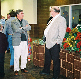 Two staff members talking